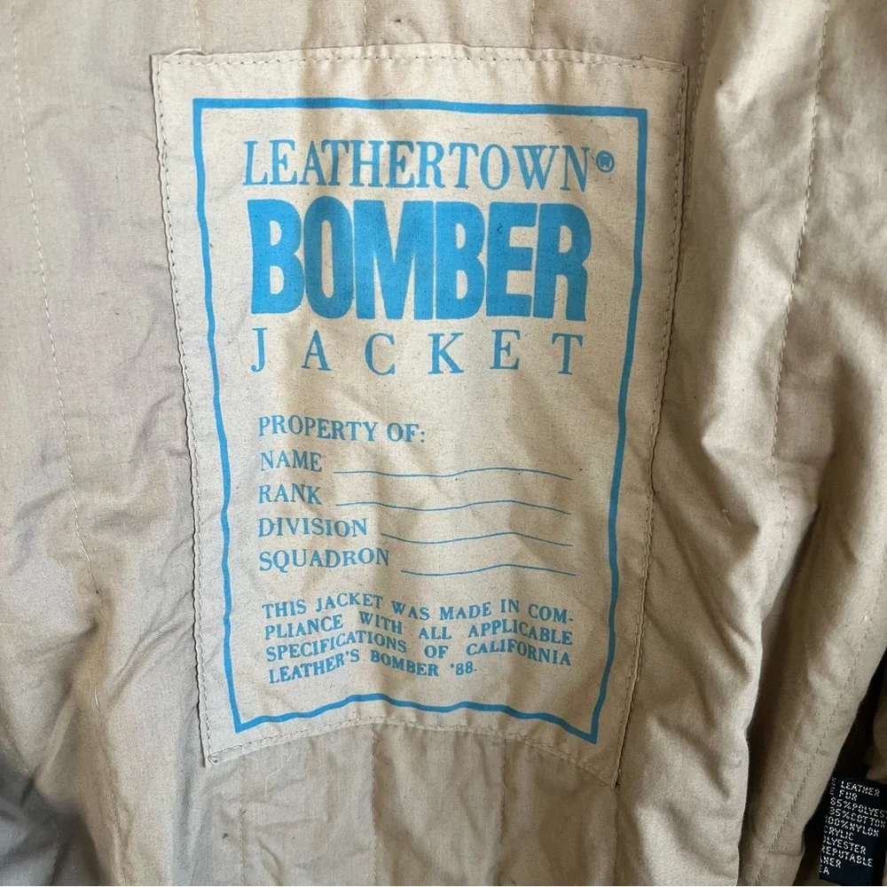 Vintage LeatherTown Bomber Aviator
Leather Jacket Size 40 Embroidered
Michelob - Picture 12 of 16